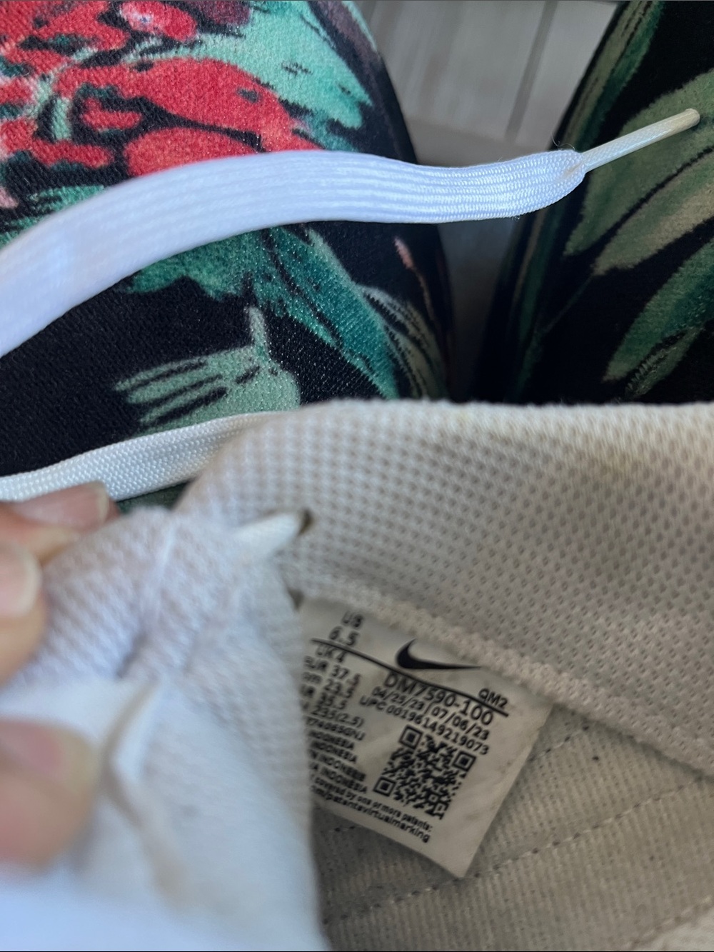 Nike White Low-Top Sneakers with Black Swoosh and Red Logo - Picture 5 of 5